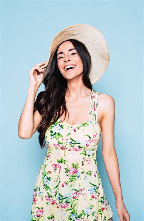 premium photo beautiful summer brunette woman in hat and colorful dress stylish girl have a