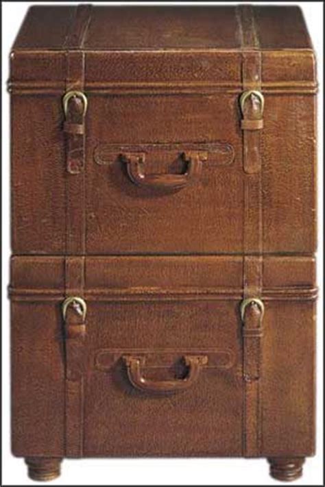 Construction is made of wood with small metal parts on handles. Small File Cabinet