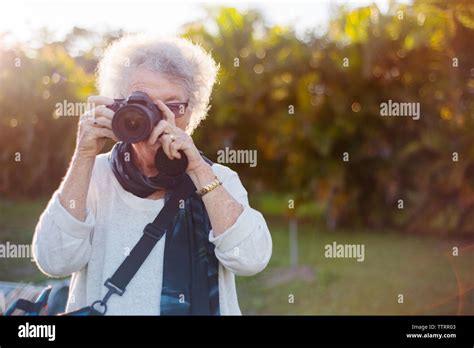 Woman Photographing Plants Hi Res Stock Photography And Images Alamy