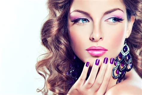 Beautiful Model With Curly Hair And Purple Manicure