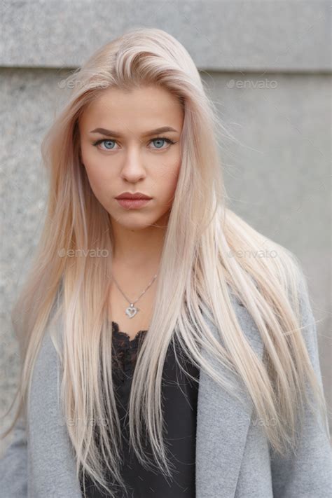 Stunning Blue Eyed Blond Woman Portrait Stock Photo By