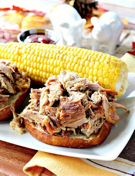 Don't forget to garnish with pickles, paprika, and pimento! Tender and Flavorful Slow Cooker Pulled Pork Recipe