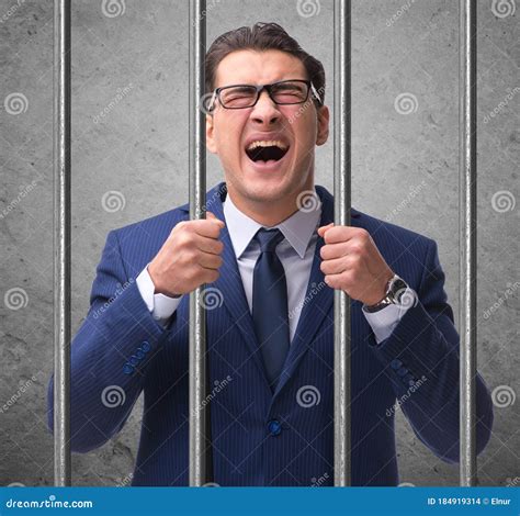 Young Businessman Behind the Bars in Prison Stock Photo - Image of