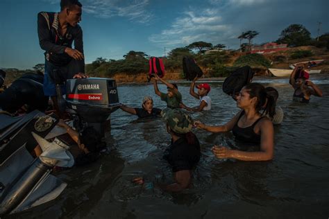 hungry venezuelans flee in boats to escape economic collapse the new york times