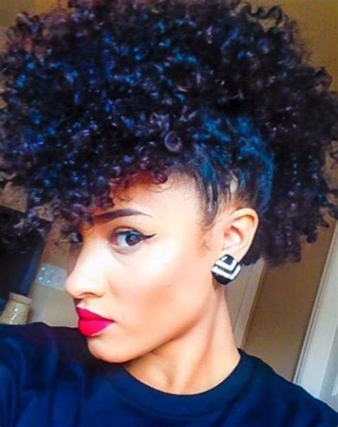 Gather all your hair in a top bun. 50 Mohawk Hairstyles for Black Women | StayGlam