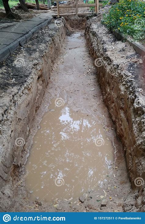 Huge Trench Ditch For Cable Power Line Gas Or Water Utility Pipe