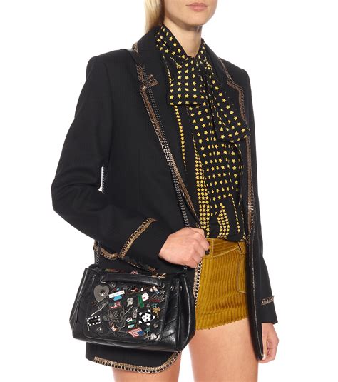 Maybe you would like to learn more about one of these? Saint Laurent Nolita Small Leather Shoulder Bag in Black ...