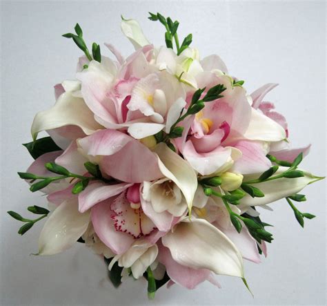 Calla lilies add some elegance to any function, but are an great choice for. CYMBIDIUM CALL AND FREESIA BOUQUET - Dahlia Floral Design