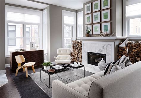 Browse living room decorating ideas and furniture layouts. Beautiful living room fireplace with marble face and a ...