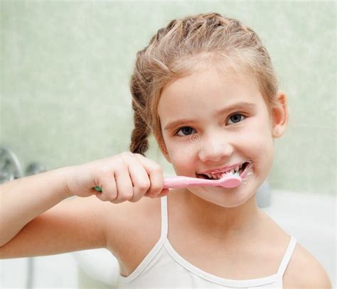Smiling Cute Little Girl Brushing Teeth Stock Image Image Of