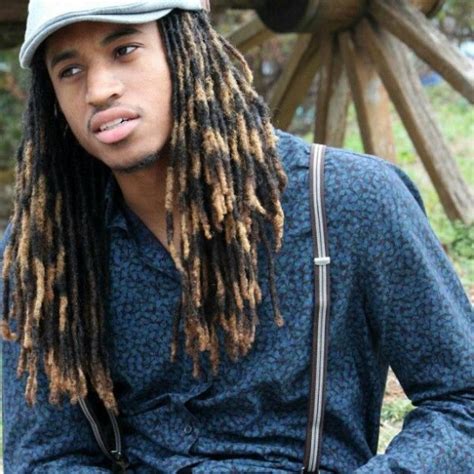 Dyed dreads bring in the potential for guys to leverage coloring trends. two color dreadlocks