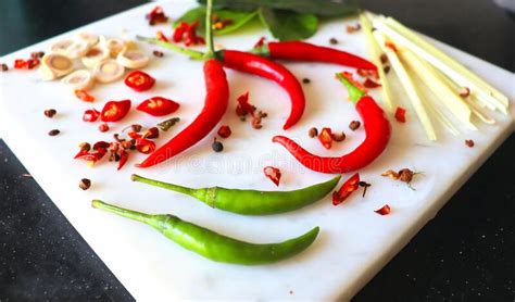 Spices In The Kitchen Ingredients Garlic And Hot Chili Peppers Stock