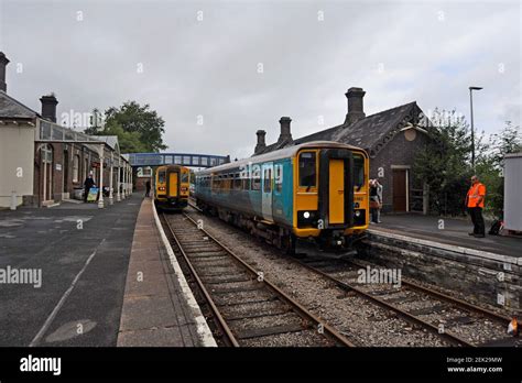 Passengers Getting On Class 153 Dmu Trains At Llandrindod Wells Station