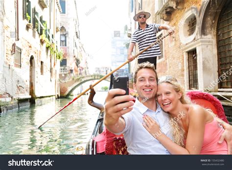 Couple In Venice On Gondola Ride Romance In Boat Happy Together On Travel Vacation Holidays