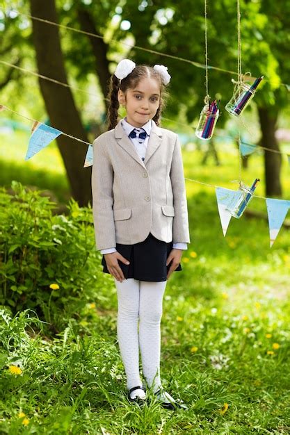 Premium Photo Portrait Of A Beautiful Schoolgirl Outdoors