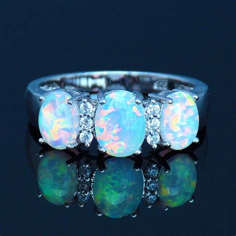 Graceful Ocean Blue Fire Opal Ring With Brilliant Cubic Zirconiablue