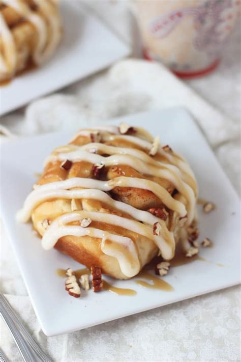 Spread the topping over the warm cinnamon rolls once removed from the oven. Apple Pecan Cinnamon Rolls with Cream Cheese Frosting