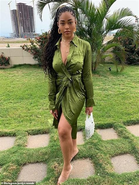 Jordyn Woods Goes Braless In Plunging Khaki Dress As She Steps Out In Lagos Photos