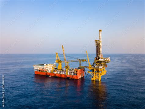 Aerial View Of Tender Drilling Oil Rig Barge Oil Rig In The Middle Of