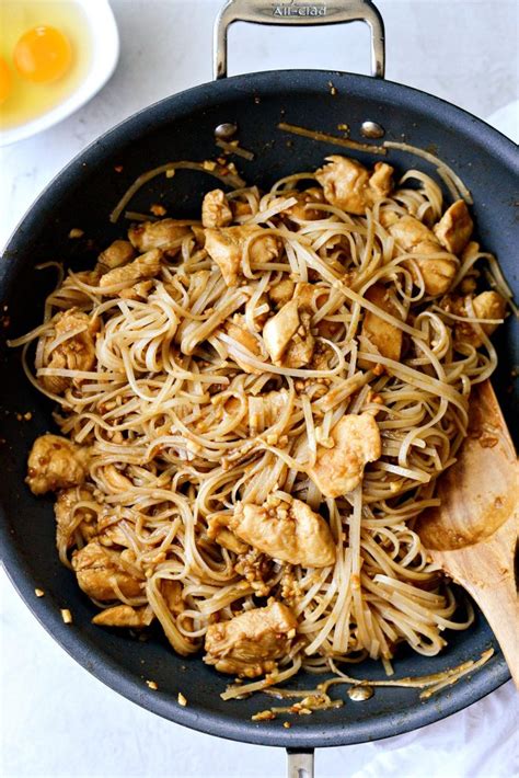 Serve the pad thai with the coriander leaves, lime wedges, peanuts and remaining spring onions and bean sprouts. Easy Chicken Pad Thai Recipe - Simply Scratch