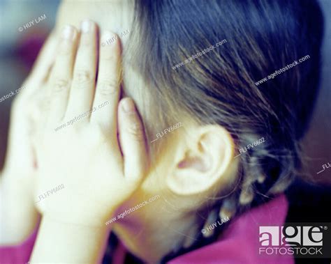 Fv6602 Huy Lam Girl Covering Face With Hands Stock Photo Picture