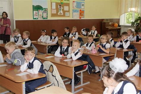 Pupils At A School Desk At A Lesson At School Russia Moscow The First High School The First