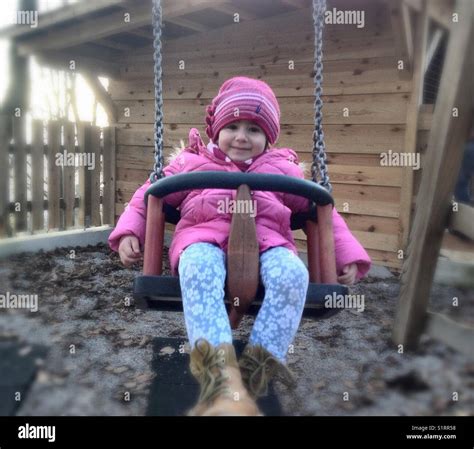 Little Girl Swing Stock Photo Alamy