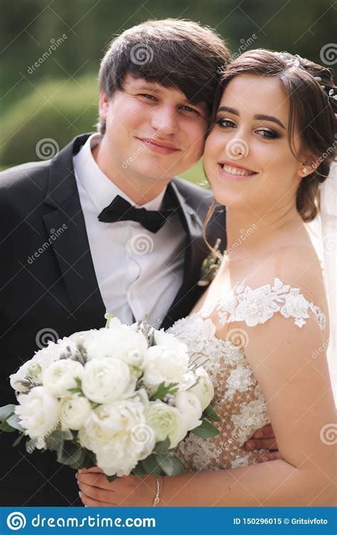 Close Up Portrait Of Beautiful Wedding Couple Handsome Groom With
