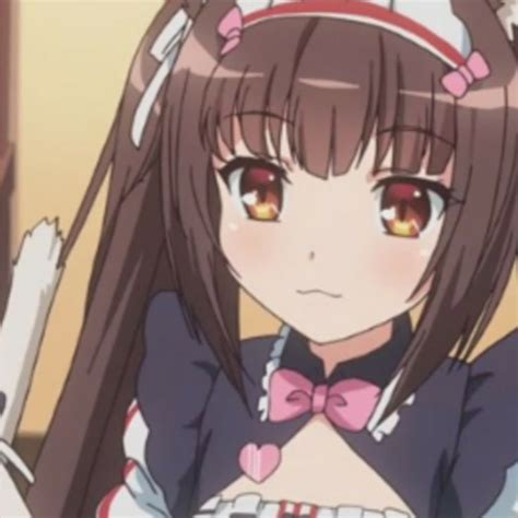 An Anime Girl With Long Hair And Big Eyes Wearing A Pink Bow Around Her