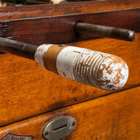 It is a miniature of table top game. Foosball Table at 1stdibs