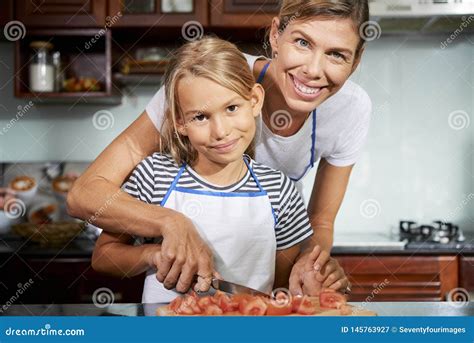 Mother Teaching Daughter How To Cook Stock Image Image Of Mother