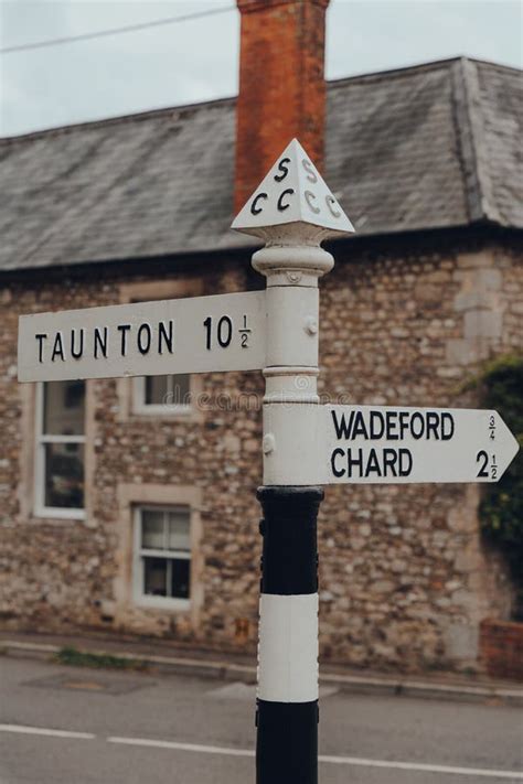 Directional Signs On A Street In Combe St Nicholas Somerset Uk