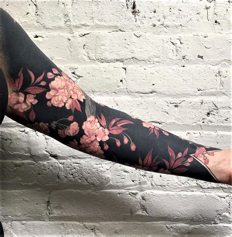 Flowers And Blackout Sleeve Tattoo Sleeve Tattoos Solid Black Tattoo