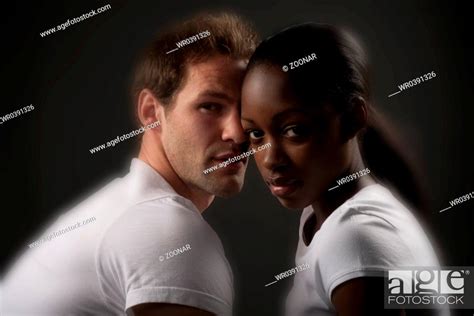 Interracial Couple Sharing And Intimate Moment Stock Photo Picture And Royalty Free Image Pic