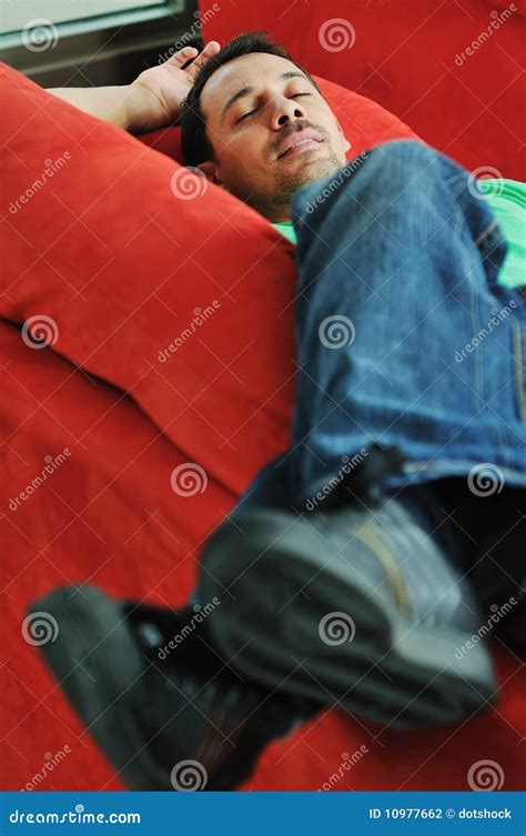 Man Relaxing On Sofa Stock Photo Image Of Indoor Looking 10977662