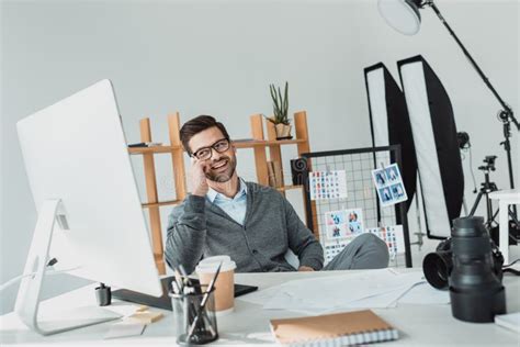 Photographer Working In Office Stock Photo Image Of Creative
