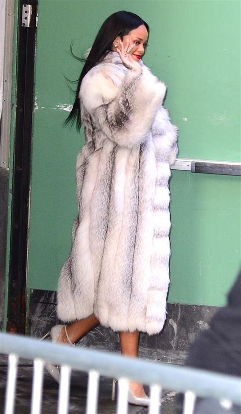 Rihanna Whips Off Huge Fur Coat To Reveal Two Amazing Outfits In One