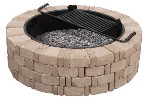 When purchasing bricks for the fire pit wall, go for something sturdy like retaining wall bricks or concrete pavers. Ashwell Fire Pit Kit at Menards | Small garden fire pit ...