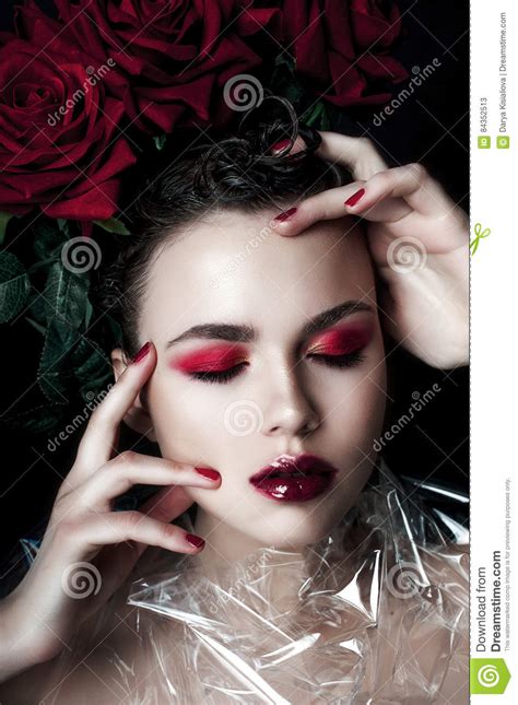 Beauty Fashion Model Woman Face Portrait With Red Rose