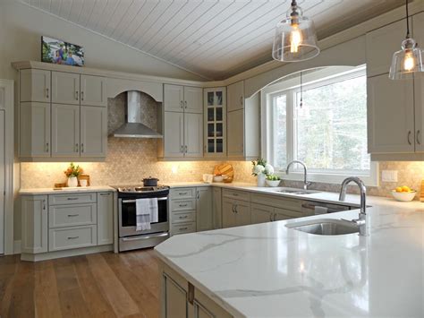 Spacious And Warm Kitchen With Bright Lighting And Quartz Countertops