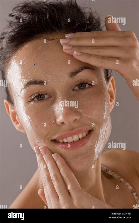 Woman Peeling Face Stock Photo Alamy