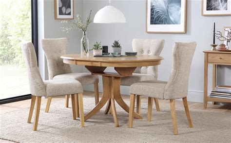 Which brand has the largest assortment of round dining room sets at the home depot? Hudson Round Extending Dining Table & 4 Chairs Set (Bewley Oatmeal) Only £399.99 | Furniture Choice