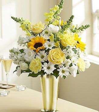 Artificial flower supplies are the experts in all things floral. Yellow and white flowers arrangement with gold vase photo.JPG