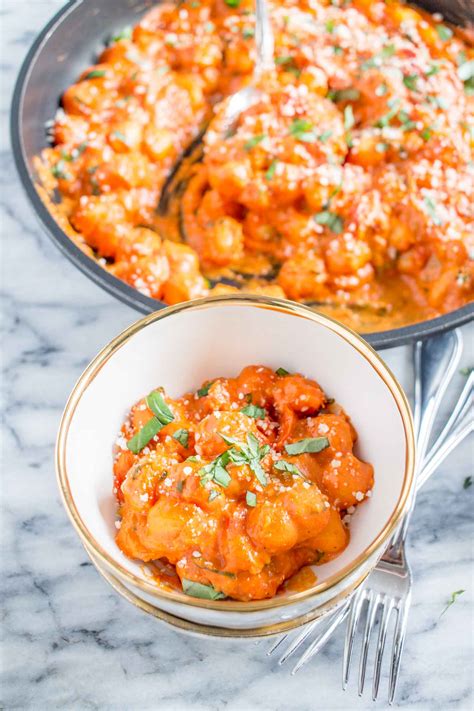 Drop the gnocchi into the water, stirring the pot with a slotted spoon to keep the gnocchi from sticking to each other. Gnocchi in Roasted Tomato Sauce | How Cook Store-Bought ...
