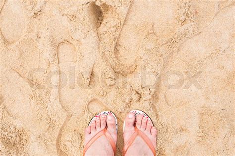 Holiday Concept Woman Feet Close Up Relaxing On Beach Stock Image