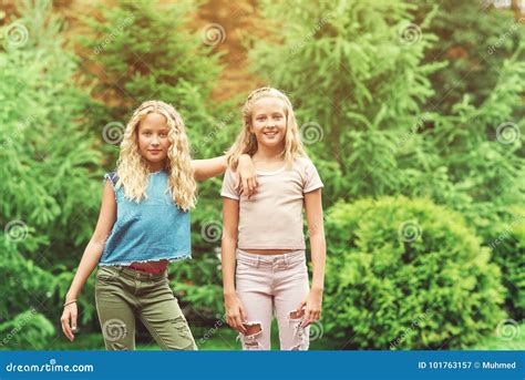 Portrait Of Beautiful Teenager Girls Twins At Park Stock Image Image