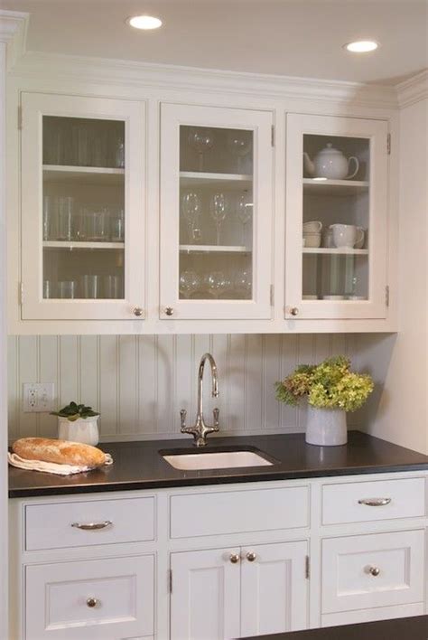 Take a peek into this elegant kitchen, where vintage cabinet doors in antique interested in seeing how antique white cabinets can be matched with your countertop of choice? source: Huestis Tucker Architects website Gorgeous kitchen ...