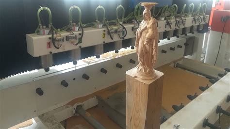 4 Axis 12 Heads Cnc Router For Carving Wooden Buddha Statue Sundor Laser