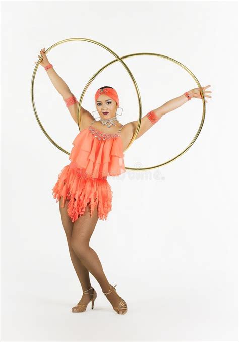 A Charming Girl Performs Circus Elements With A Hula Hoop Stock Image