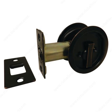 The handle comes attached to a pivot at the top. Pocket Door Pull - Round - Richelieu Hardware